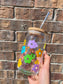 Colorful Daisies Can Glass